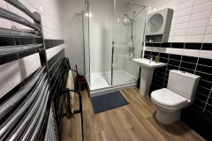 Spacious master bathroom at The Joseph Cosy with large walk-in shower