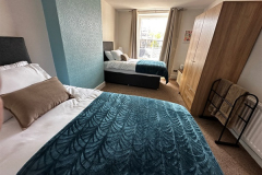 Large spacious bedroom at The Joseph Cosy with flexible twin or three single bed layout