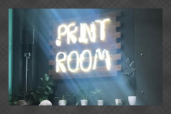 Neon sign inside The Print Room café at The Storey in Lancaster