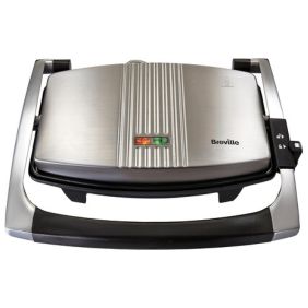 A silver-colored Breville sandwich and panini press with a stainless steel finish, designed for making grilled sandwiches and toasties.