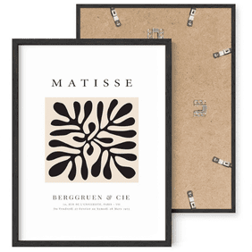 A modern black-framed art piece featuring Matisse-inspired abstract botanical designs. The bold black lines contrast with the white background, creating a timeless and artistic statement.