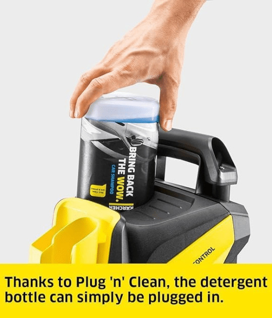 Adding detergent to the Kärcher pressure washer using the Plug ‘n’ Clean feature.