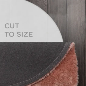 A close-up of a round-cut rug, demonstrating the customizable cut-to-size feature.